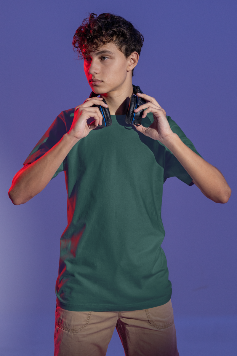 t shirt mockup of a serious gamer about to put on some headphones m28451s
